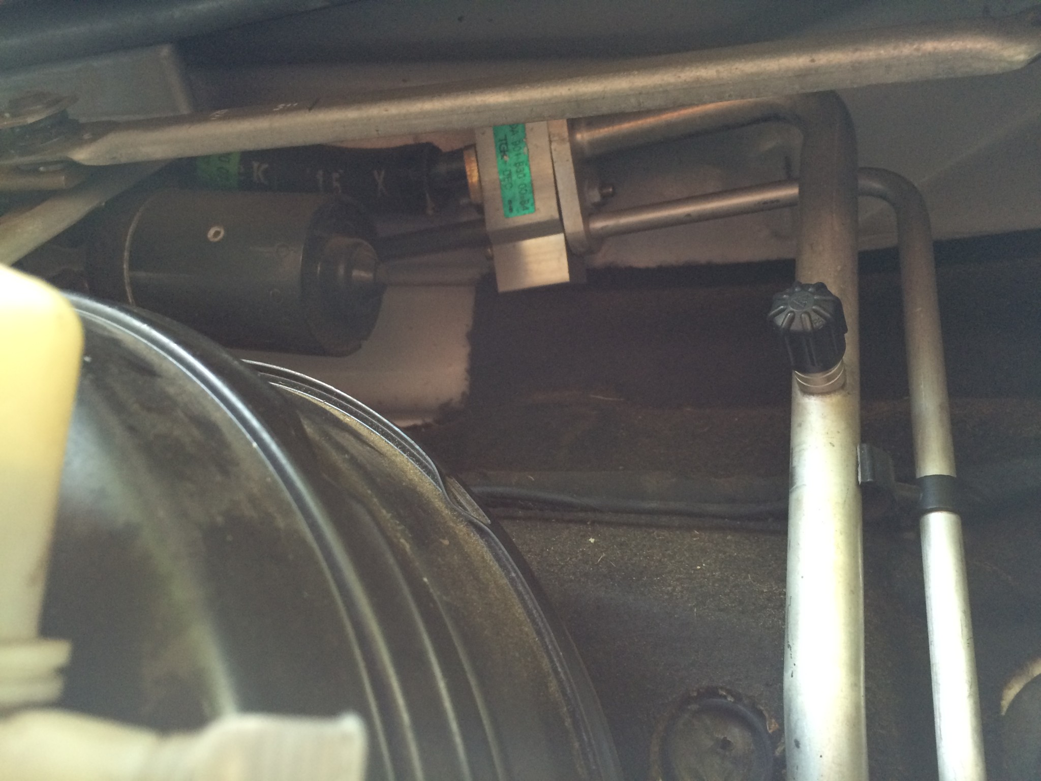 Location of the A/C Expansion Valve in the engine compartment.